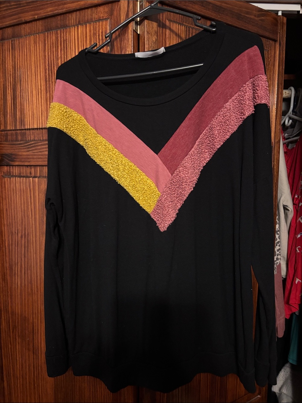Black Long-Sleeve Sweatshirt with Pink and Mustard Chevron Detail